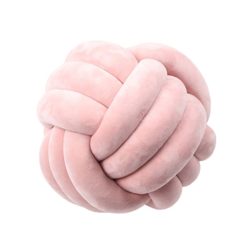 Coussin décoratif rond à motif boule en peluche nouée