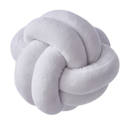 Coussin décoratif rond à motif boule en peluche nouée