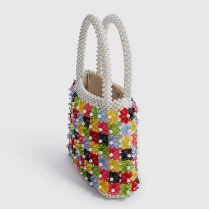 Bolso de perlas trenzado a mano con corazón de flores a la moda para mujer