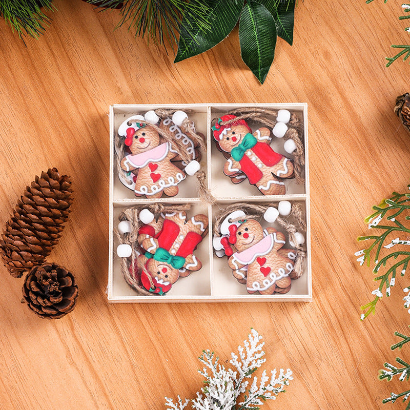 Caja colgante con adornos navideños de madera con forma de hombre de jengibre