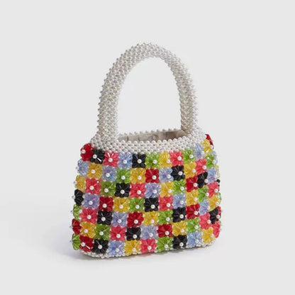 Bolso de perlas trenzado a mano con corazón de flores a la moda para mujer