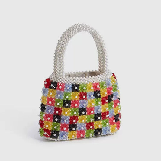 Bolso de perlas trenzado a mano con corazón de flores a la moda para mujer