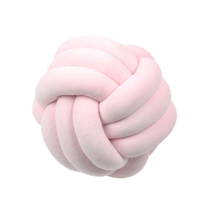 Coussin décoratif rond à motif boule en peluche nouée