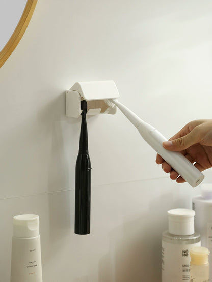 Estante para cepillos de dientes con caja de almacenamiento de drenaje eléctrico montado en la pared