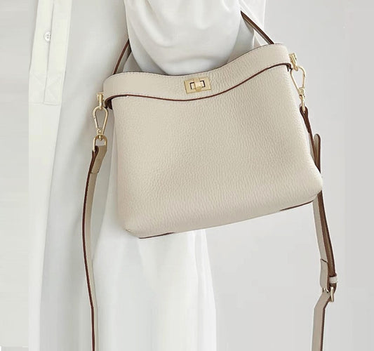 Bolso bandolera con textura de viaje de temperamento simple y versátil a la moda para mujer